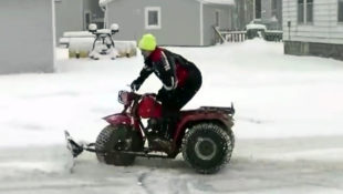Video: Big Red Trike Moving Snow