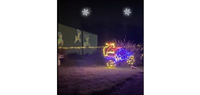 Youtune Short of Santa on a Quad in string lights for the holidays