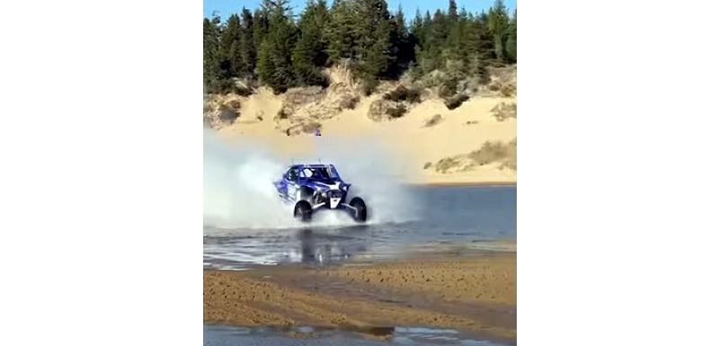 RZR skimming over the water at UTV Takeover in this Youtube clip