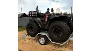 Youtube short of massive wheeled ATV being unloaded from trailer