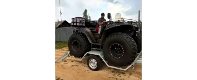 Youtube short of massive wheeled ATV being unloaded from trailer