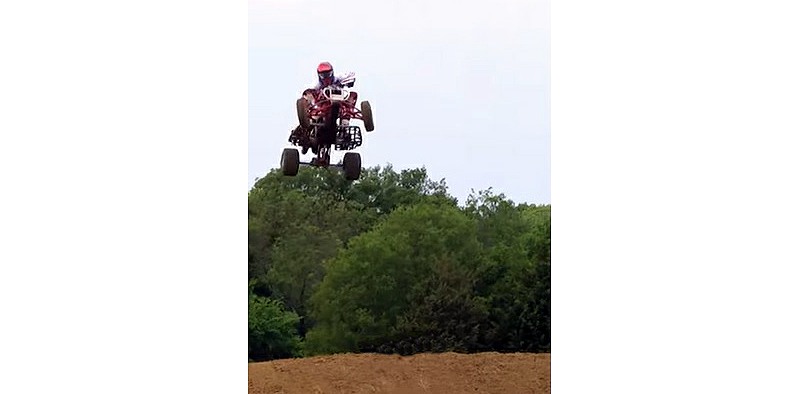 Youtube video of ATV crash as a result of coming up short on a jump