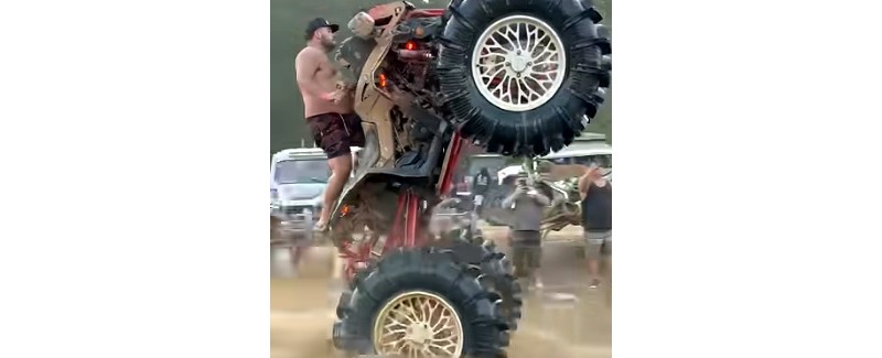 Youtube clip of mud built ATV wheelie